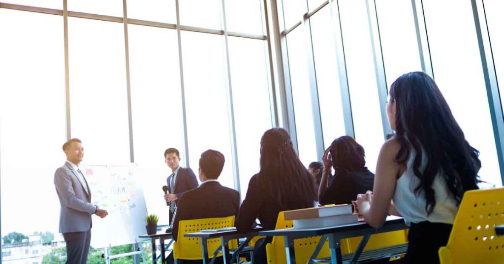 group of workers in training session