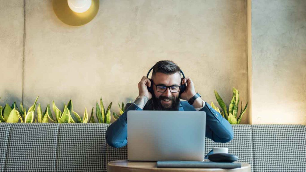 man having video call with laptop